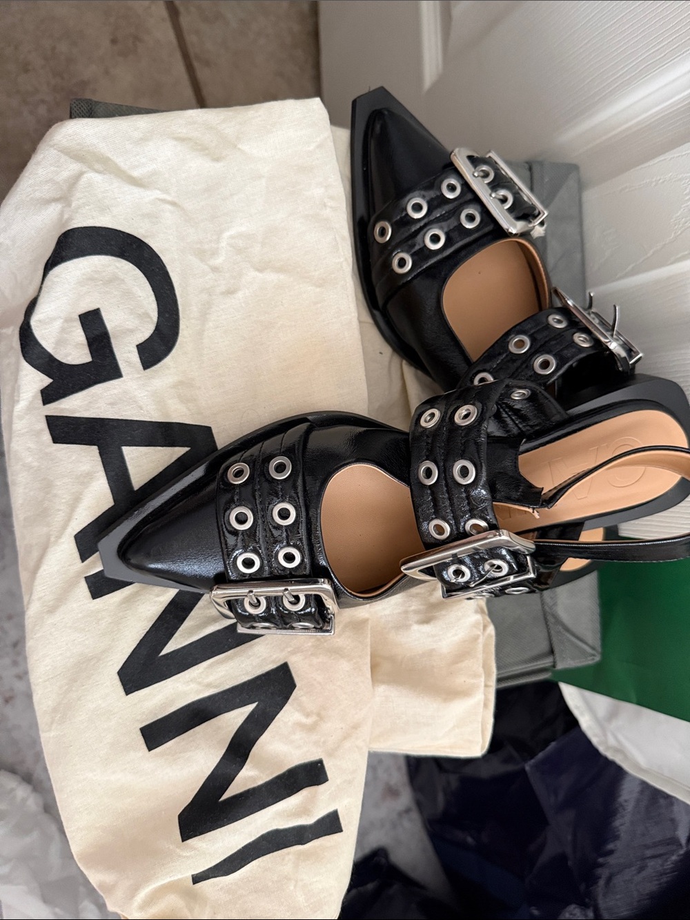 Ganni Black Leather Pointed Slingback Flats with Silver Eyelet Straps